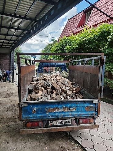 Вывоз строительного мусора и кирпичного боя на грузовом бортовом
