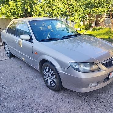 киа на продажу: Mazda Familia: 2002 г., 1.6 л, Автомат, Бензин, Седан — 1