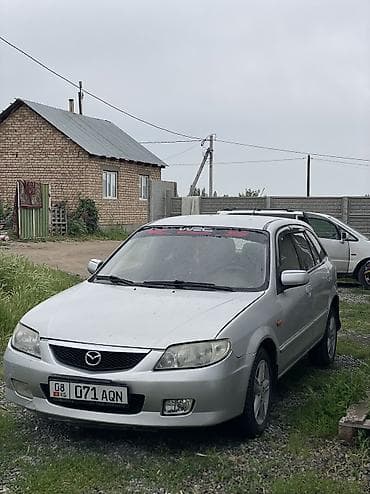 mazda 3: Mazda 323: 2000 г., Механика, Бензин, Универсал — 1