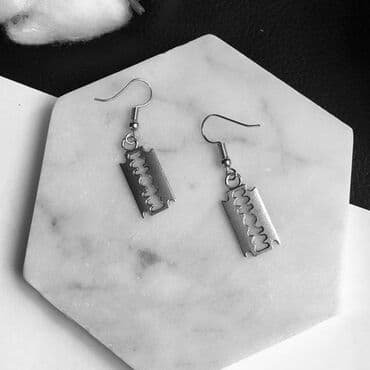 брит: Серьги в форме лезвий НС — смелый и дерзкий аксессуар для тех, кто — 4