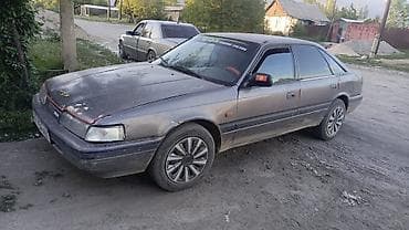 кызыл октябрь: Mazda 626: 1990 г., Кол менен иштөөчү, Седан — 4