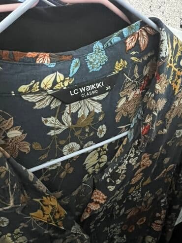 Киреге берилүүчү кийимдер: Стильные женские рубашки выполненные из легкой ткани. Размеры разные — 2