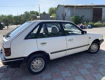 гц 8: Mazda 323: 1987 г., 1.5 л, Механика, Бензин, Хэтчбэк — 3