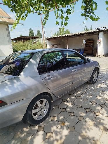 чери арризо 8 салон: Mitsubishi Lancer: 2006 г., Седан — 5