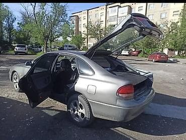 выхлоп прямоток: Mazda 626: 1992 г., 2 л, Механика, Бензин, Лифтбек — 2