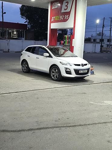 митцубиси кольт: Mazda CX-7: 2011 г., Кроссовер — 7