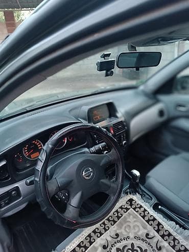 e star: Nissan Almera: 2003 г. — 9