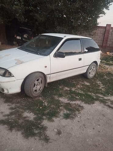 Suzuki Swift: 1989 г., 1.3 л, Кол менен иштөөчү, Бензин, Хетчбек lalafo.kg да Suzuki Swift: 1989 г., 1.3 л, Кол менен иштөөчү, Бензин, Хетчбек