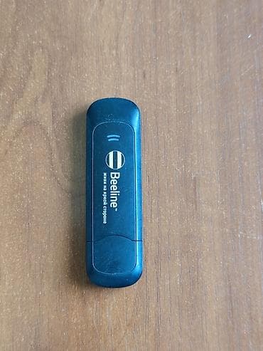 Модемы и сетевое оборудование: 3G USB‑модем Beeline (брендированный Huawei) - Модель: Huawei E1550 — 1