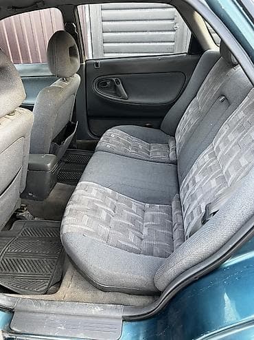 привазной матор 1: Mazda : 1993 г., 2 л, Механика, Бензин, Хэтчбэк — 5