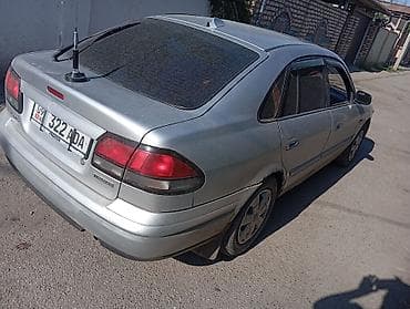 suzuki lets: Mazda 626: 2000 г., 1.8 л, Механика, Бензин, Хэтчбэк — 3