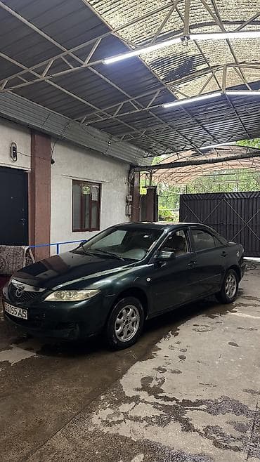 bmw 745i: Mazda 6: 1999 г., 2 л, Механика, Бензин, Седан — 4