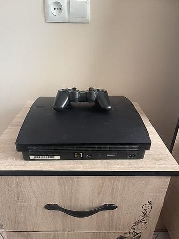 купить sony playstation 1: Игровая приставка Sony PlayStation 3 Slim с беспроводным геймпадом — 2