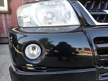 Системы освещения: Фара противотуманная Mitsubishi Pajero V75 6G74 3.5Л 2003 перед. прав — 1