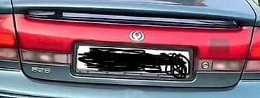 авто киа спортейдж: Крышка багажника Mazda — 1