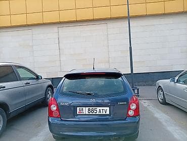 e2 byd: Mazda 323: 2002 г., 1.6 л, Механика, Бензин, Универсал — 2