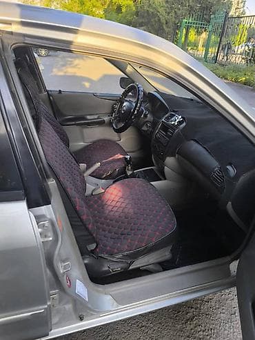 mazda 3: Mazda 323: 2001 г., 1.6 л, Механика, Бензин — 5