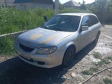 Унаа: Mazda 323: 2000 г., 1.6 л, Кол менен иштөөчү, Бензин, Хетчбек — 1
