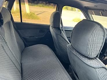 highlander 2012: Daewoo Nexia: 2010 г., Седан — 4