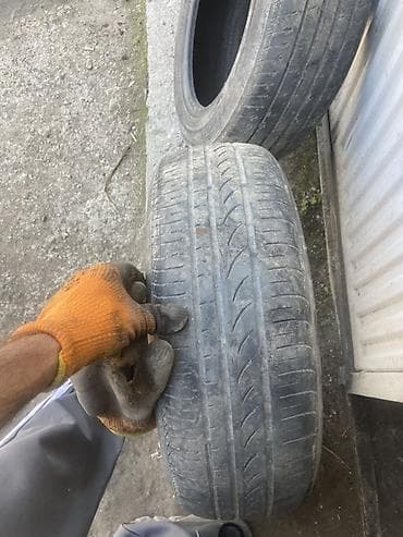 210 мес: Пара автомобильных шин 185/65/15 Пара две штуки за 2000 Без шишки — 2