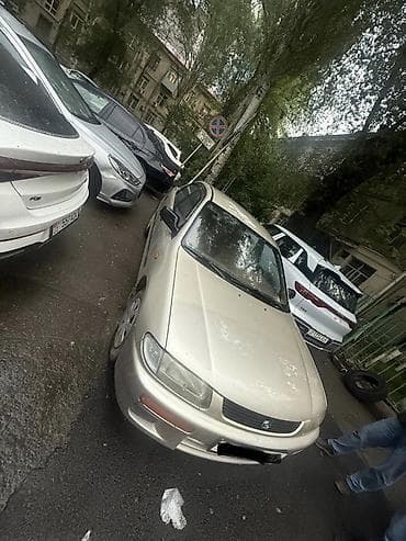 mazda 121: Mazda 323: 1996 г., 1.5 л, Механика, Бензин, Седан — 3