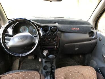 авто зеркала: Автомобиль Daewoo Matiz золотистого цвета, компактный хэтчбек с пятью — 8