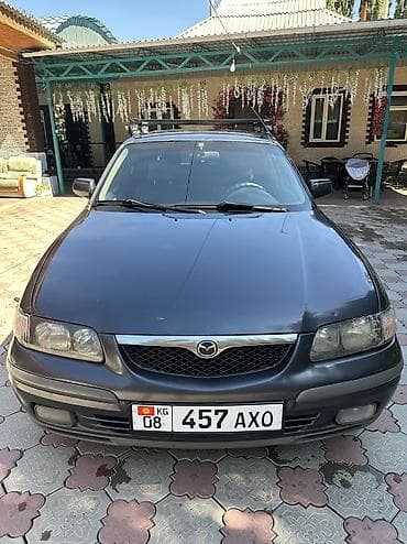 Унаа сатуу: Mazda 626: 1999 г., 1.8 л, Кол менен иштөөчү, Бензин, Седан — 7