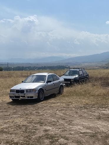 ун басандаткыч: BMW 3 series: 1990 г., 1.8 л, Кол менен иштөөчү, Бензин, Седан — 10