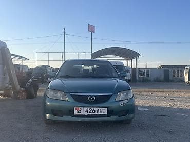Транспорт: Mazda 323: 2003 г., 1.6 л, Автомат, Бензин, Универсал — 3