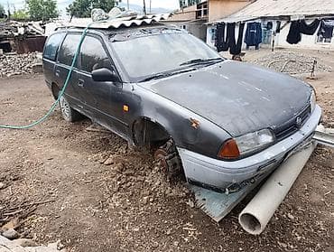 zero x neo: Nissan Primera: 1991 г., 2 л, Механика, Универсал — 1