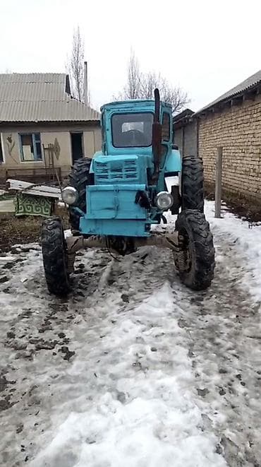 трактор юта: Трактор колесный, класс тяги примерно 1,4–2,0. Кабина закрытая — 2