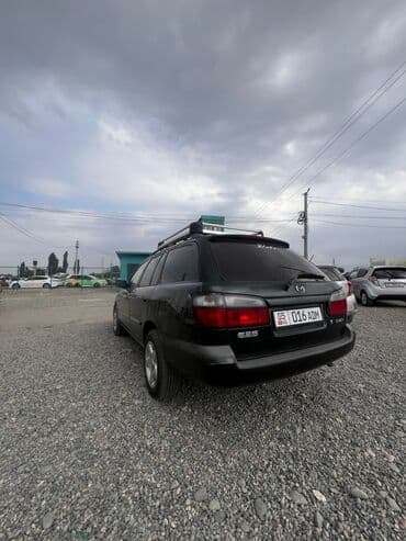антена на авто: Mazda 626: 1998 г., 1.8 л, Механика, Бензин — 4