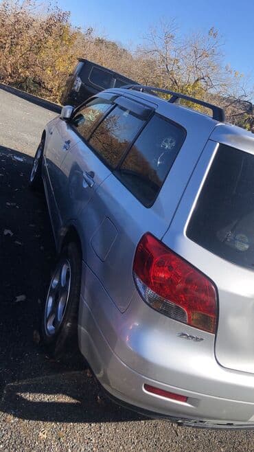 гранаты мазда: Митсубиси Аэртрек — 3