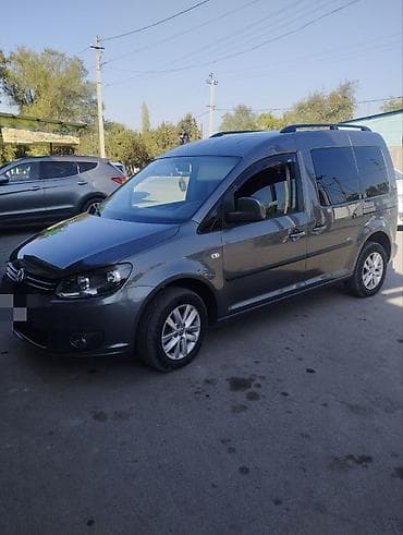 Volkswagen Caddy: 2014 г., 1.2 л, Механика, Бензин, Универсал