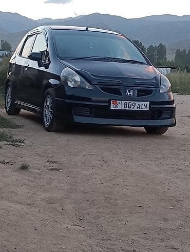 рул фит: Honda Fit: 2003 г., 1.3 л, Вариатор, Бензин, Хетчбек — 9