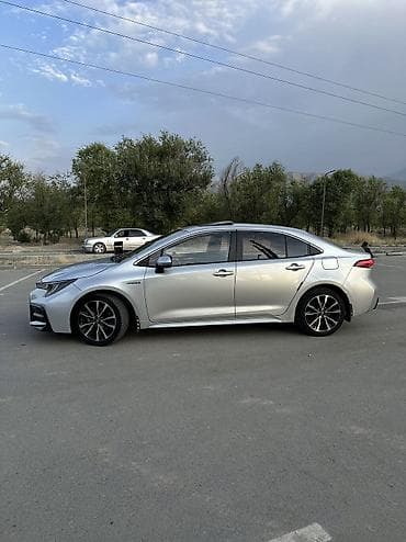 byd e2 2023: Toyota Corolla: 2021 г., 1.8 л, Автомат, Гибрид, Седан — 3