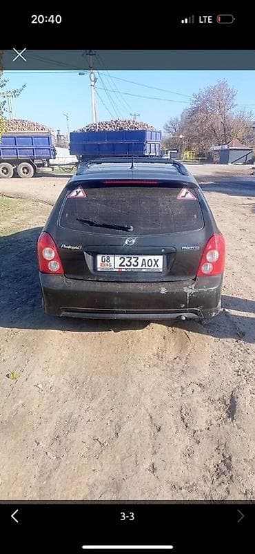 мазда 2001: Mazda Protege: 2001 г., Хэтчбэк — 3