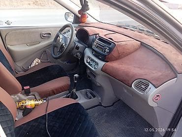 несия: Nissan Tino: 2001 г., 1.8 л, Механика, Бензин, Хэтчбэк — 2