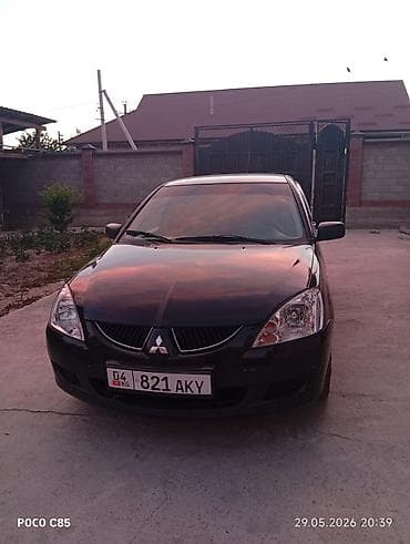 jet ski: Mitsubishi Lancer: 2004 г., 1.6 л, Механика, Бензин, Универсал — 4