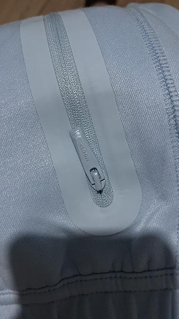 Спортивные брюки Nike NOCTA - Цвет: светло‑голубой (ice blue) - — 4
