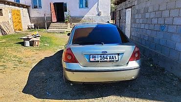 форд экскурсион: Ford Mondeo седан, серебристый металлик. Основные особенности: - Тип — 1