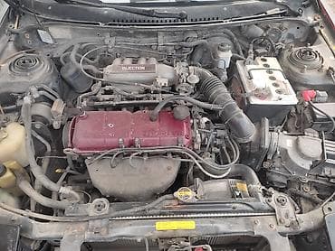 mitsubishi pojero: Mazda 323: 1994 г., Механика, Бензин — 2