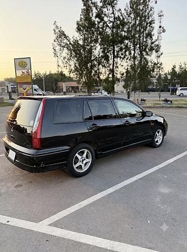 lancer x: Mitsubishi Lancer: 2001 г., 1.8 л, Вариатор, Бензин, Универсал — 4
