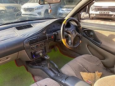 коврик ист: Toyota Cavalier: 1999 г., 2.4 л, Механика, Бензин, Седан — 2