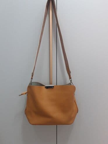 Сумочка в отличном состоянии,кожа