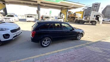 Продажа авто: Mazda : 2002 г., 1.6 л, Механика, Бензин, Хэтчбэк — 5