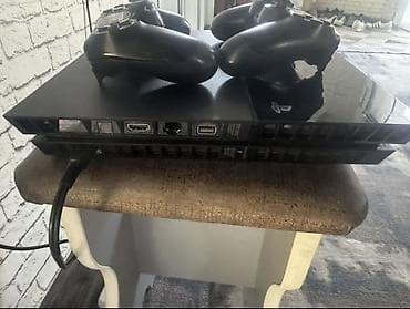 aphone 6: PlayStation 4 (оригинальная версия, «fat») с двумя геймпадами — 2