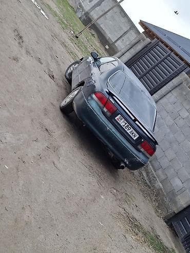 иж 3: Mazda 626: 1995 г., 1.8 л, Механика, Бензин, Седан — 9