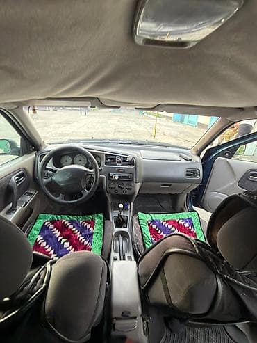 bcd com: Nissan Primera: 2000 г., 1.8 л, Механика, Газ, Седан — 4