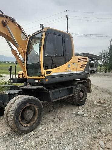 oc.lg: Экскаватор, Hyundai, 2013 г., Колесный — 2